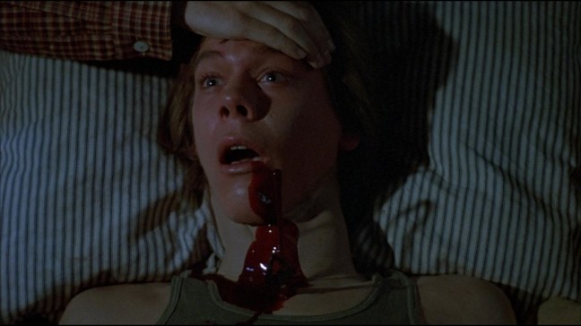 Kevin Bacon getting killed by arrowhead through the bed in Friday the 13th Part One. Gory and creative.